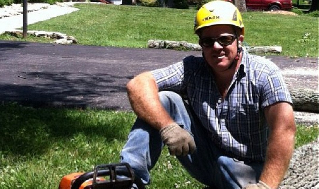 Seth A. Butcher posing for picture wearing his PPE.